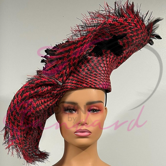 A gorgeous black and red fascinator with flowers and feathers. This is a show stopper ladies!