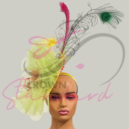 Beautiful hand dyed crinoline in a subtle lime green color on this fascinator with a flower and feathers!