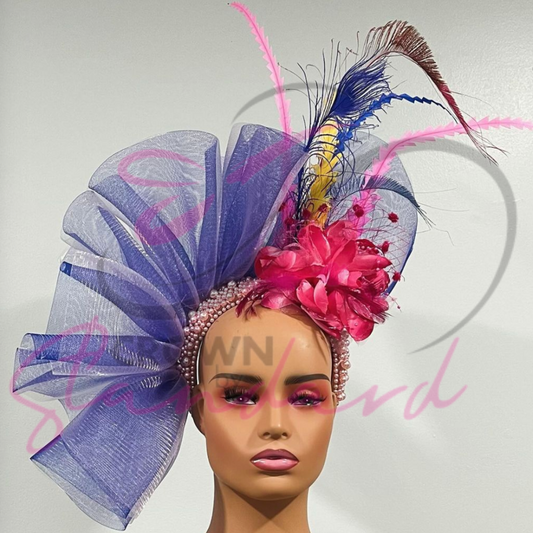 Blue and pink fascinator with pink, blue, and yellow feathers!