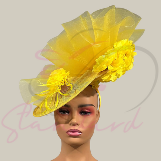 Yellow fascinator with crinoline and flowers. What a beauty!