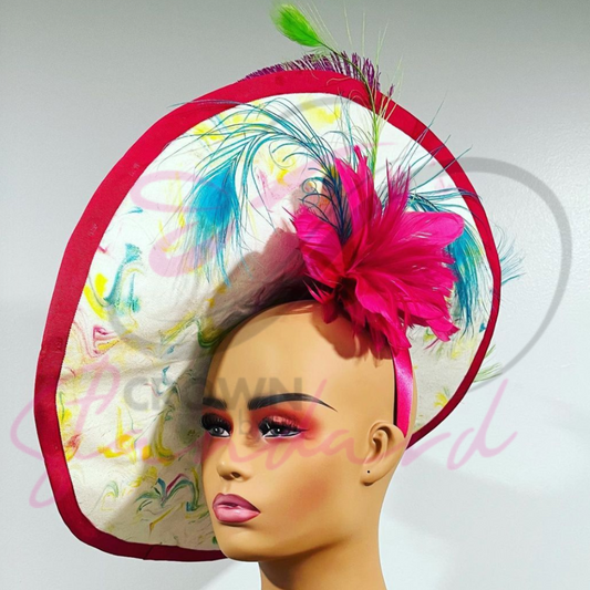 hand dyed Fascinator with blue, pink, green, and pops of yellow.