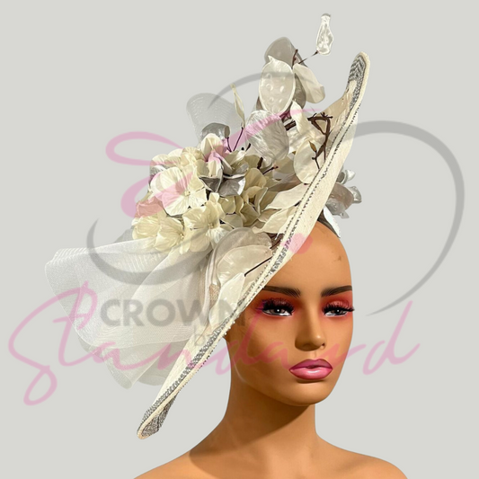 This fascinator is simply gorgeous. It has some bling that really sets it apart from the rest!